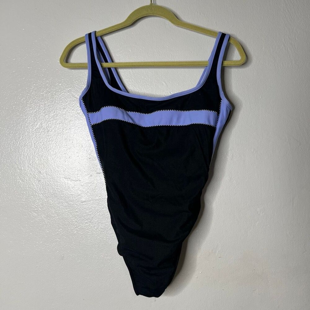 Miraclesuit colorblock one-piece swimsuit features a classic purple scoop neckli